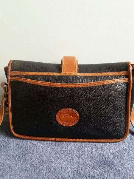 dooney and bourke purse repair|dooney and bourke refurbish.